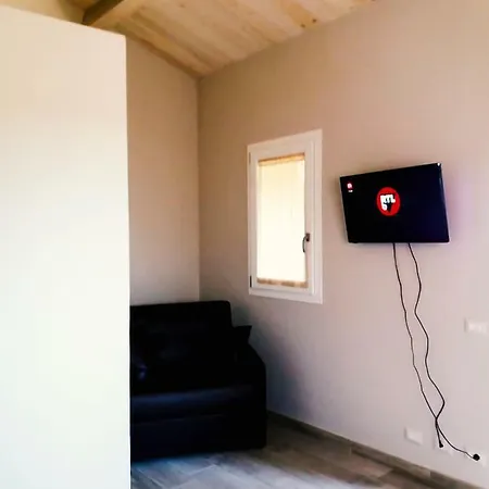 Гостевой дом Luna E' Pedra - In Con Vista Sulla Baia Di E Piscina 3*